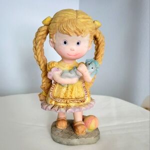 VINTAGE GIRL HOLDING DOG